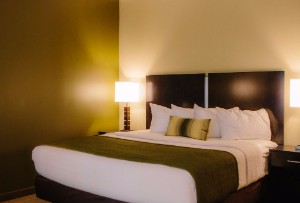Room with a king bed at The Inn and Suites at Franciscan Square
