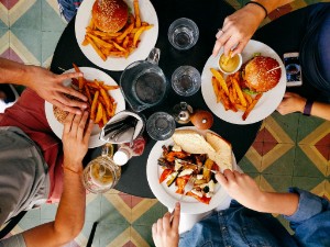 Diners eating at a restaurant.